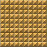 wall with yellow brown pyramid tiles pattern