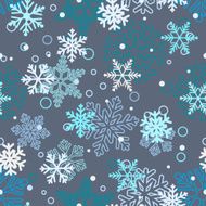 Seamless pattern of snowflakes white and blue on gray