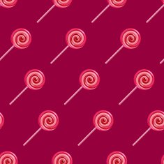 Red and pink lollipop spiral candies seamless background