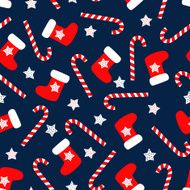 Seamless Christmas pattern with xmas socks stars and candy canes