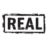 Black grunge stamp and text REAL