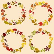 Wreaths of autumn leaves flowers and herbs