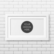 Realistic white frame on the brick wall background