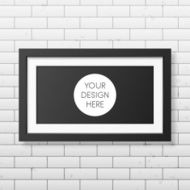 Realistic black frame on the brick wall background