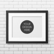Realistic black frame A4 on the brick wall background N3