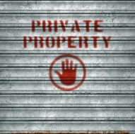weathered garage roll-up sheet door with airbrushed private property text vector