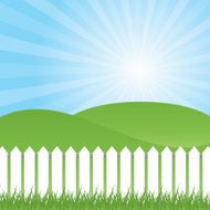 White fence and green grass on blue sky background N2
