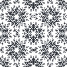 Seamless black and white background made of exotic pattern