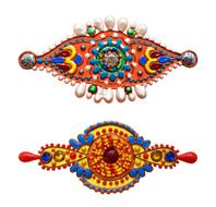 handmade ornamental ethnic design element with jewel and gold