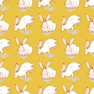 Seamless pattern with white rabbit on a yellow background