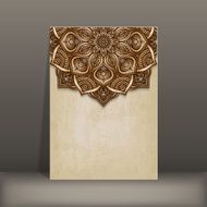 grunge paper card with brown floral circular pattern
