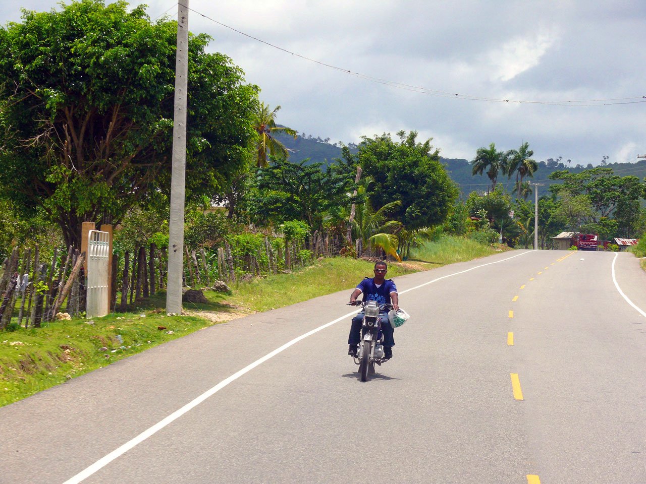 Biker on a motorcycle in the Dominican Republic free image download