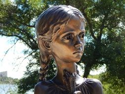 child gold statue