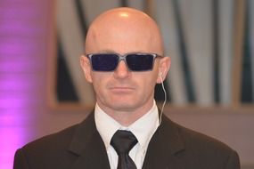 security guard with glasses
