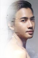 portrait of a young Thai man on glass
