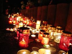 candles on graves for the day of the dead