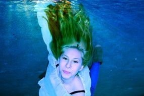 girl underwater swim