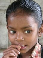cute pensive indian girl