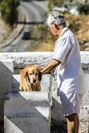 old man near a dog