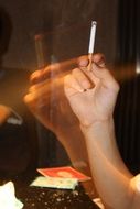 cigarette in male hand