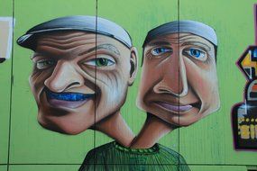 graffiti in the form of a man with two heads