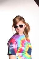 portrait of a girl in a multi-colored t-shirt