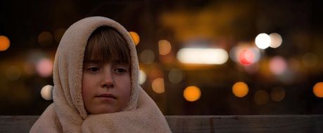 girl's face with her head covered