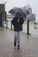 boy with umbrella in London, United States