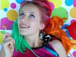 smiling girl with colorful hair