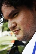 young man with bristles in profile close-up