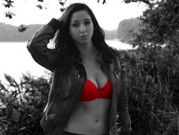 black white photo of girl in red bra