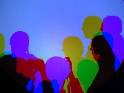 Colorful shadows of people