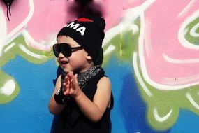 baby hip-hop on background graffiti