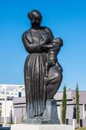breastfeeding statue in a park