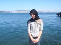 girl in a headscarf on the coast of Istanbul