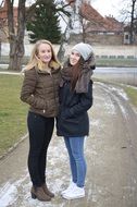 two friends walk in the park