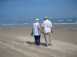 elderly couple on the beach for relaxation