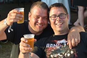 friends drink beer at the festival