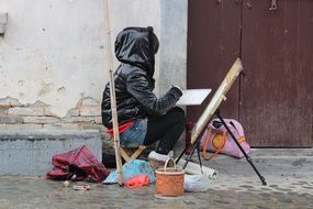 girl painting on street, china