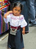 child in a suit in Ecuador