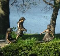 а public art in the form of sculptures of girls