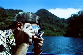 photographer takes a picture of nature