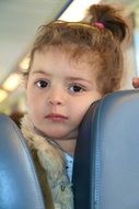 curious child in public transport