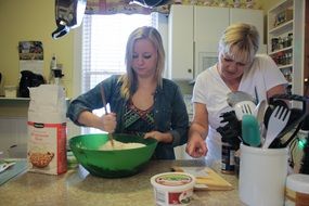 sisters preparing a festive meal