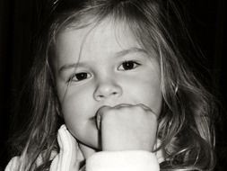 thinking little girl