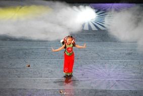 little girl performing on stage
