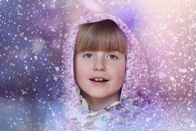 Portrait of the smiling girl with headwear at colorful background with snowflakes
