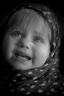 little girl with opened mouth photo