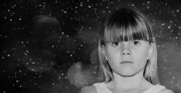 Black and white portrait of long haired girl