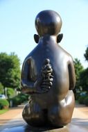 child sculpture on the street